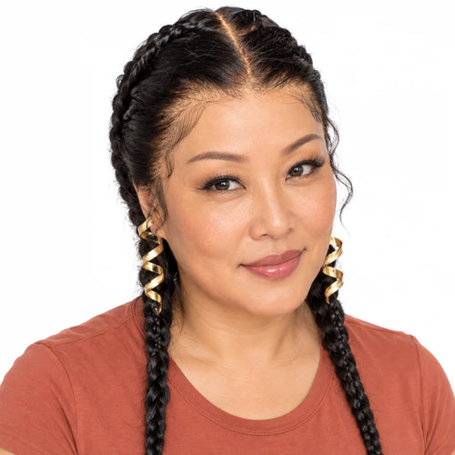 Mavelle natural model wearing 13x4 Bleached Knot Lace Frontal Braid Closure